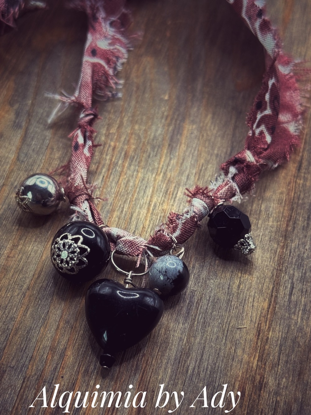 Sculptural Black Heart Charm Necklace with Deep Burgundy Ribbon